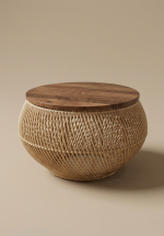 Woven rattan stool/table with a round wooden lid against a neutral backdrop